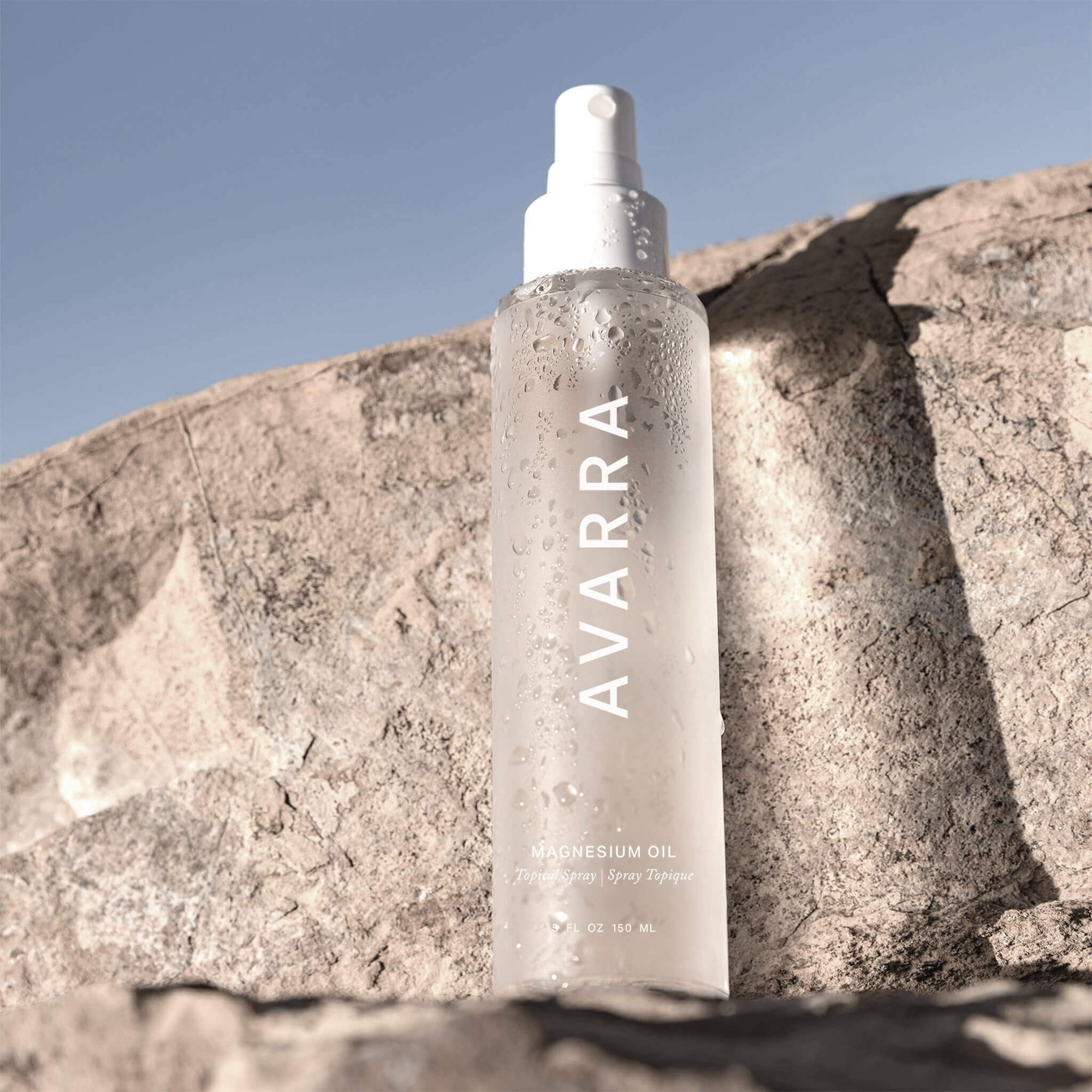 Avarra magnesium oil on a rock ledge  with blue sky in the background