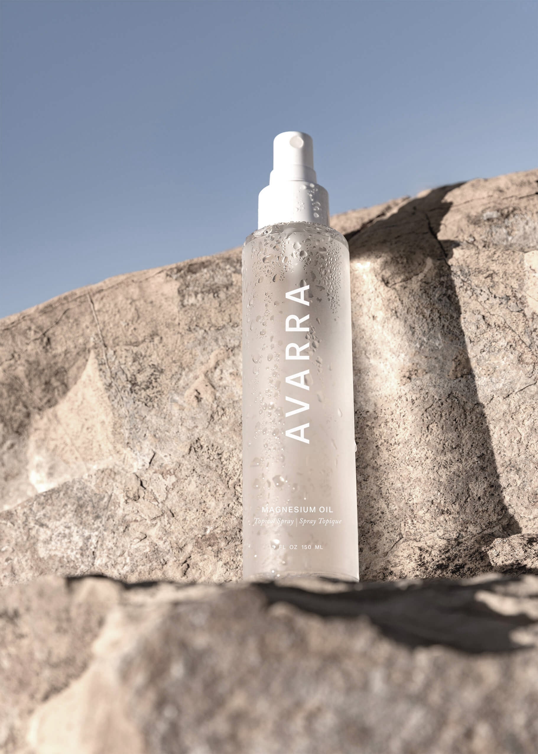 Avarra magnesium oil on a rock ledge  with blue sky in the background